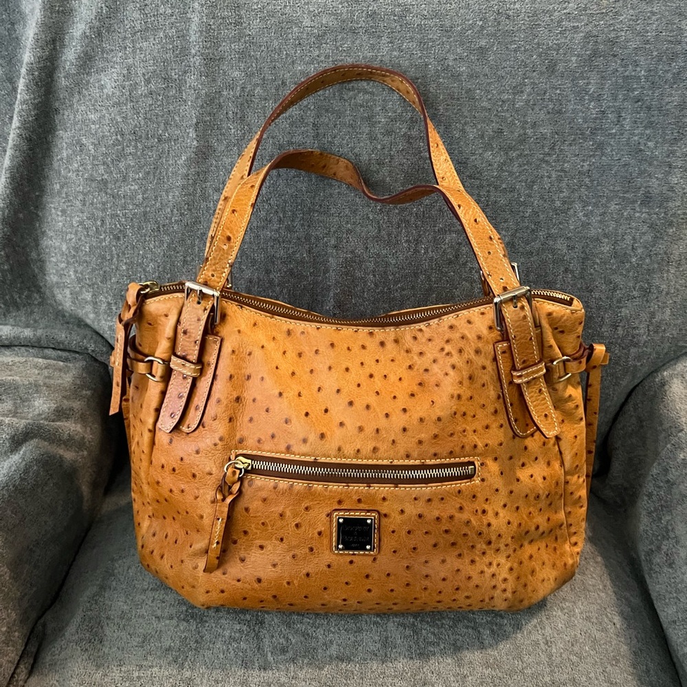 Dooney & Bourke Ostrich embossed leather satchel in brown.